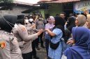 Ibu Nafsia selaku ahli waris tanah dan salah satu warga saat berkoordinasi terkait bukti dan hak kepemilikan tanah kepada pihak kepolisia. (12/09/26). Dok. Agis