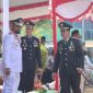 Foto Kapolres Halsel AKBP Hendra Gunawan, S.H., S.I.K., M.M., bersama Bupati Halsel, Hasan Ali Bassam Kasuba dan Dandim 1509 Labuha Letkol Inf. Syamsul, S.I.P., Paska selepas Upacara peringatan HUT ke-81 Tentara Nasional Indonesia (TNI) di Lapangan Makodim 1509 Labuha, Senin (5/10/2026). Dok. Ian. 